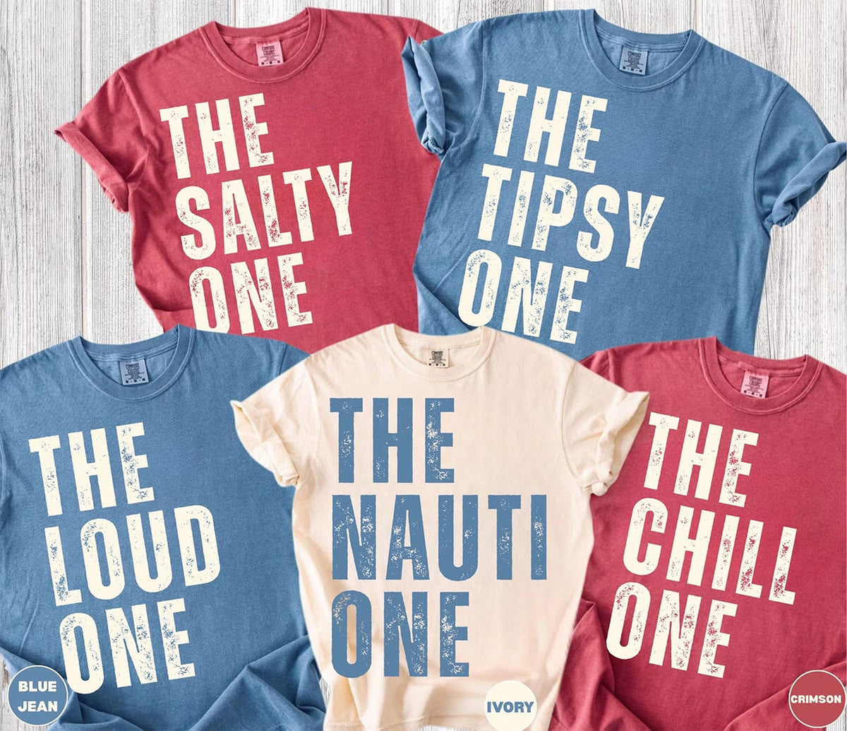 The ___ One matching cruise crew tee -- The Salty One, Tipsy One, Loud One, Nauti One and Chill One shown in crimson, blue jean and ivory