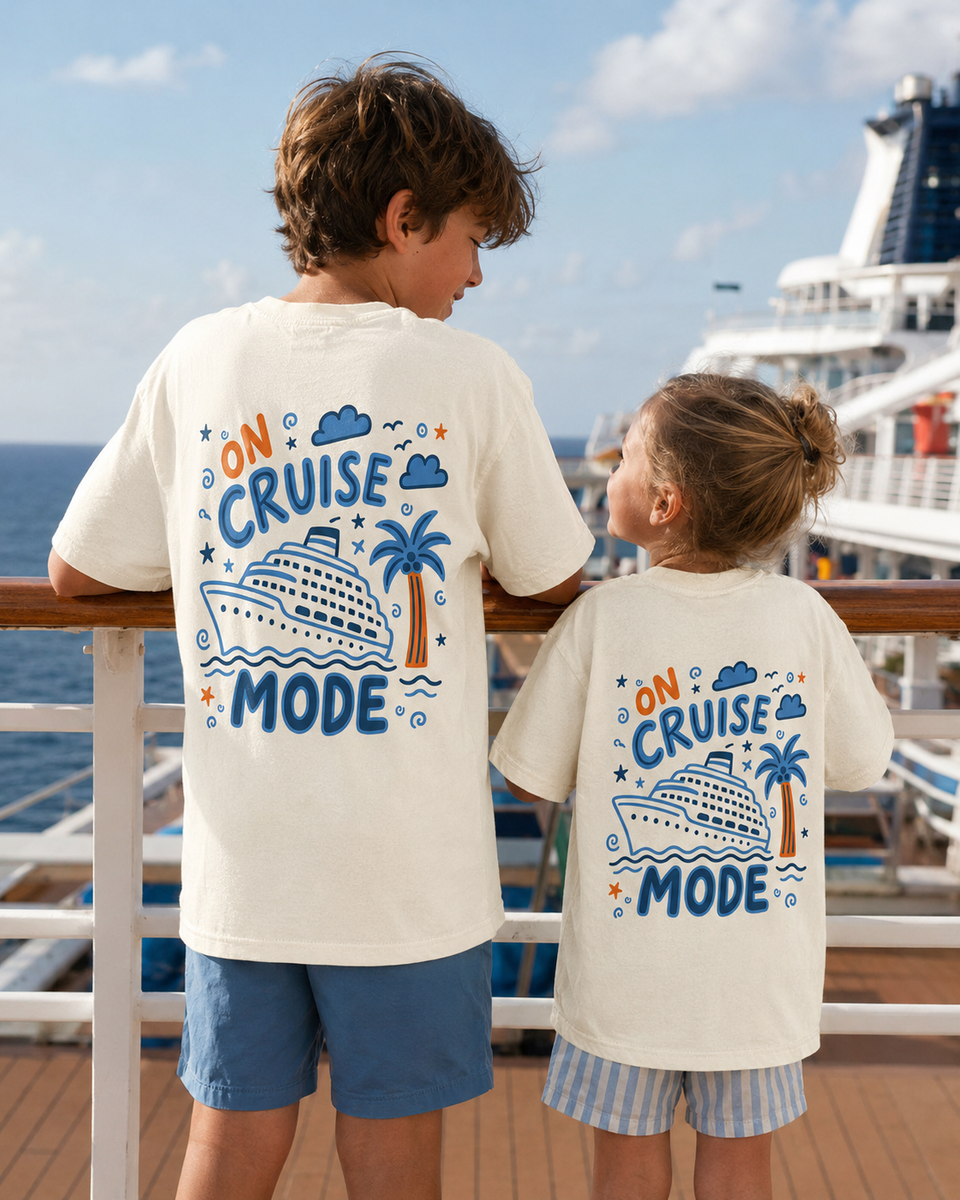Two kids on cruise ship in matching On Cruise Mode doodle tees